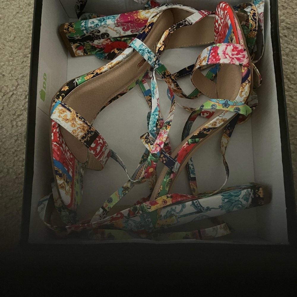 Beautiful laced up heels, never worn.